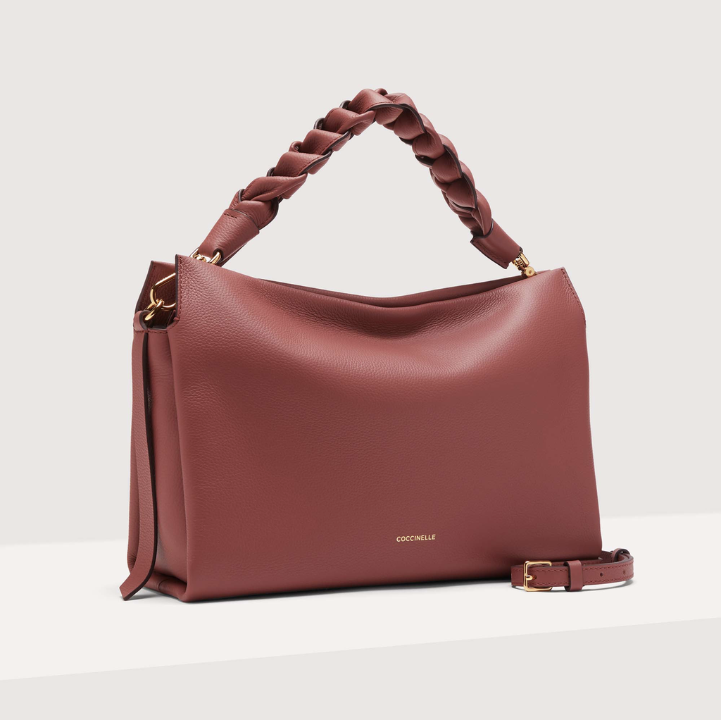 COCCINELLE handtas riem vlecht roze
